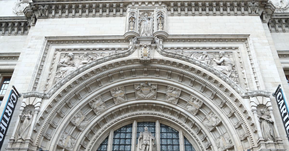 Close-up view of an ornate architectural arch adorned with intricate sculptures and reliefs.